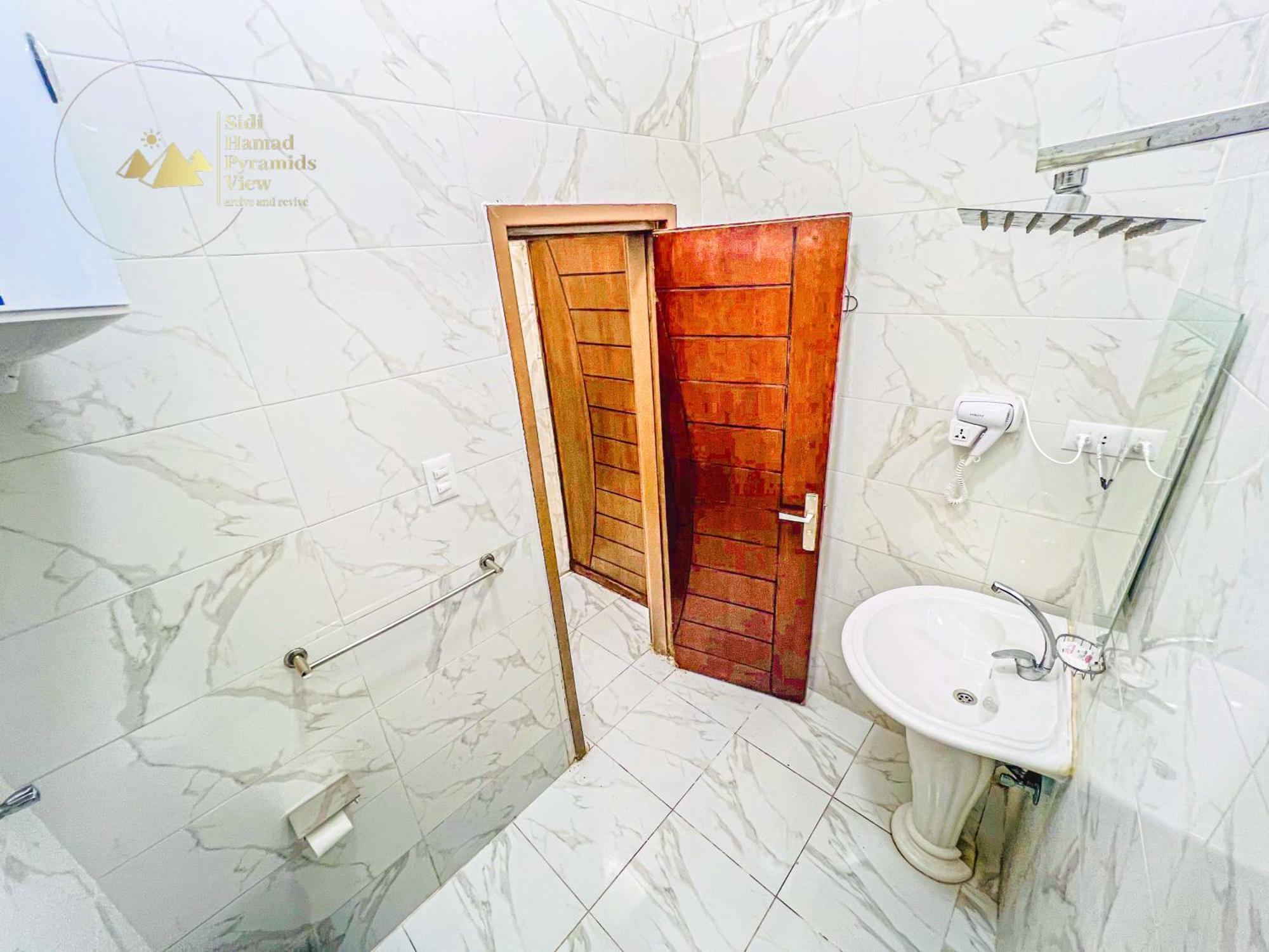 Kafret el-Gabal Sidi Hamad Pyramids View酒店 外观 照片
